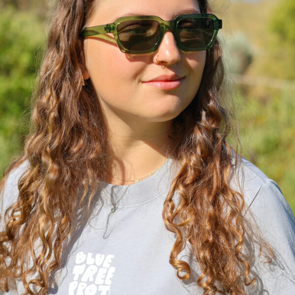 Women's Bubble Tee in soft fabric featuring a relaxed fit and Blue Tree Project written in bubble font, designed to raise mental health awareness