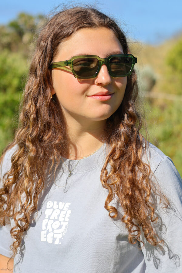 Women's Bubble Tee in soft fabric featuring a relaxed fit and Blue Tree Project written in bubble font, designed to raise mental health awareness